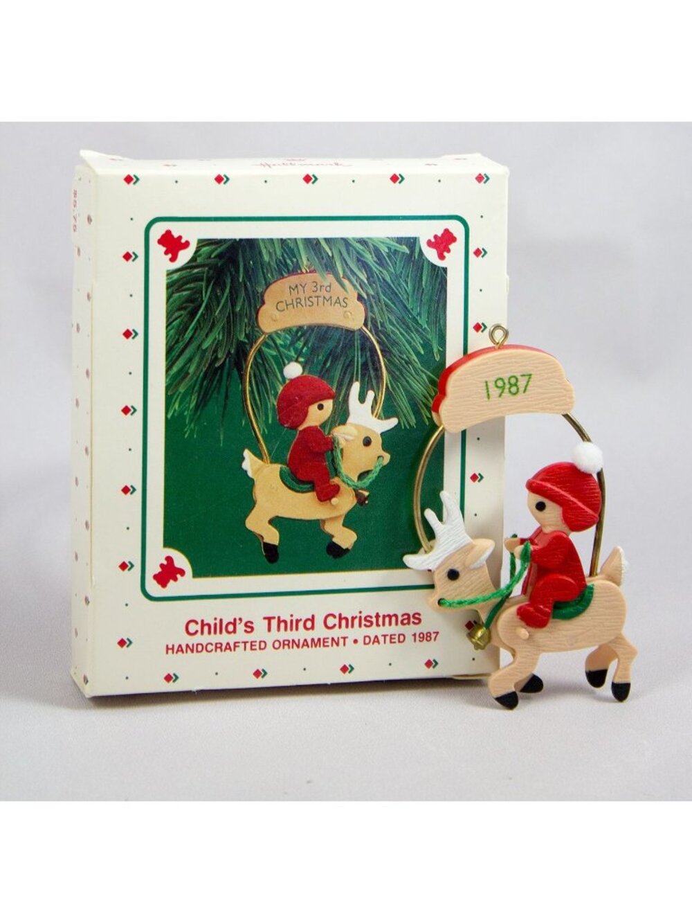 Hallmark KS Motion Ornament Child's Third Christmas Galloping Reindeer & Child